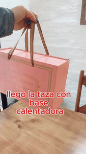 Tasa con base calentadora